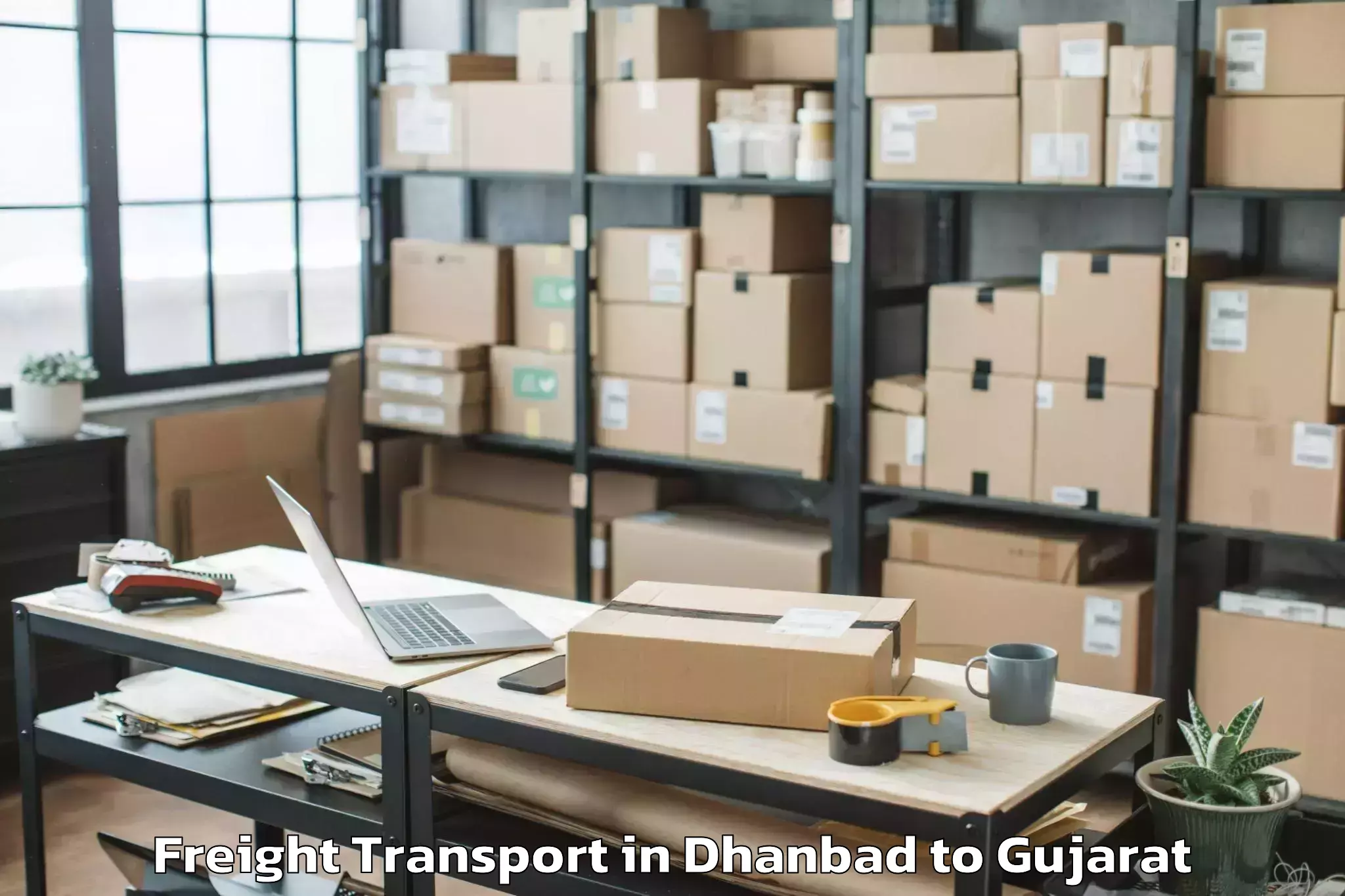 Book Your Dhanbad to Damnagar Freight Transport Today